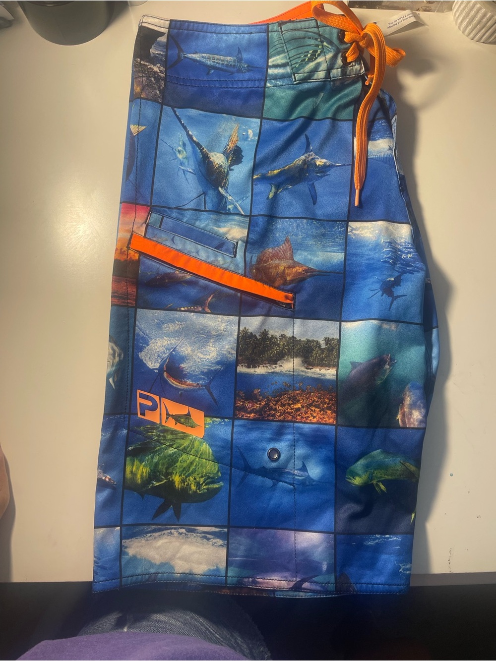 Pelagic Blue Ocean Photo-Block Swim Shorts with Orange Accents